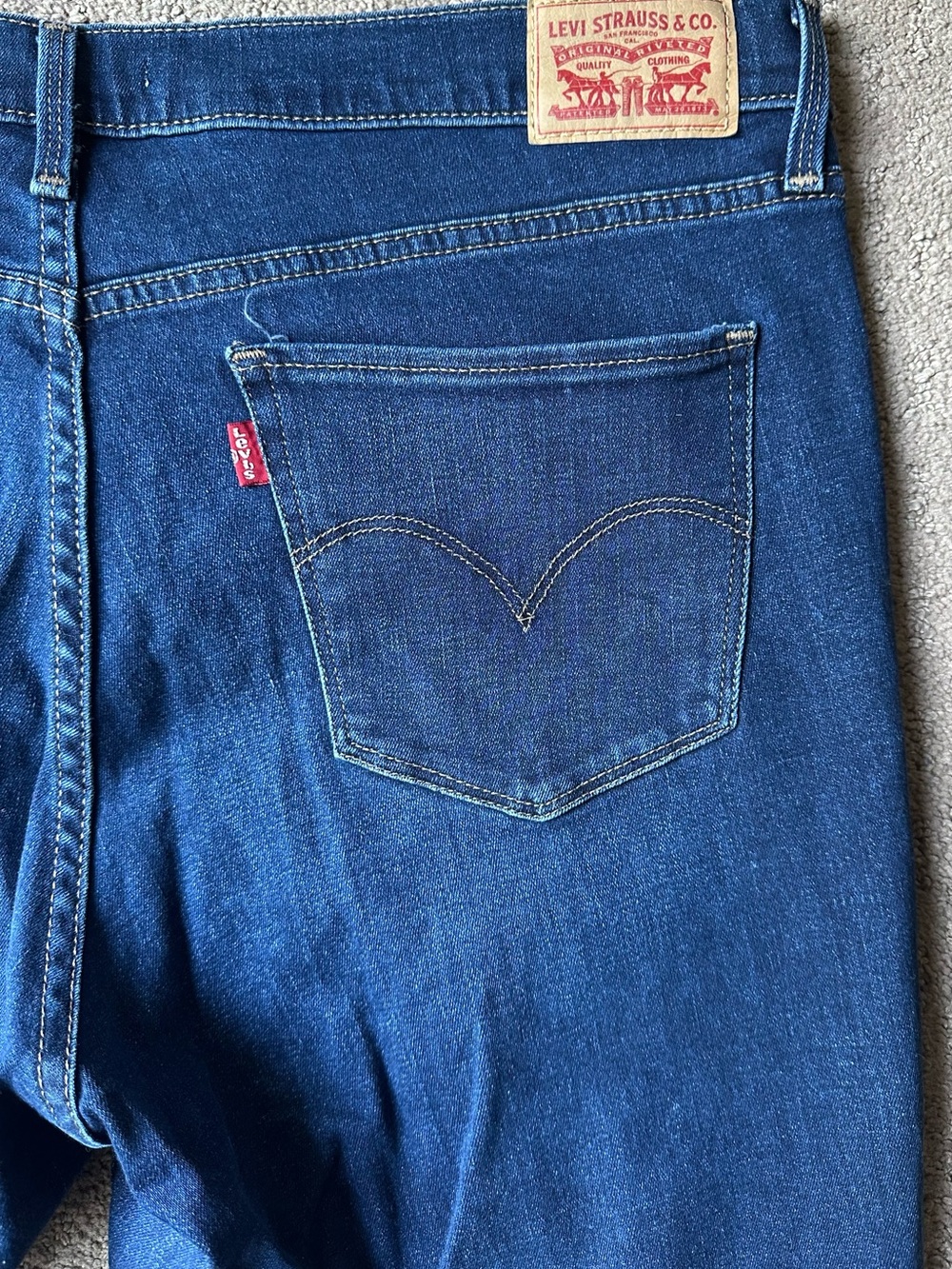 Levi's Women’s Slim Fit Dark Blue Jeans with Signature Red Tab